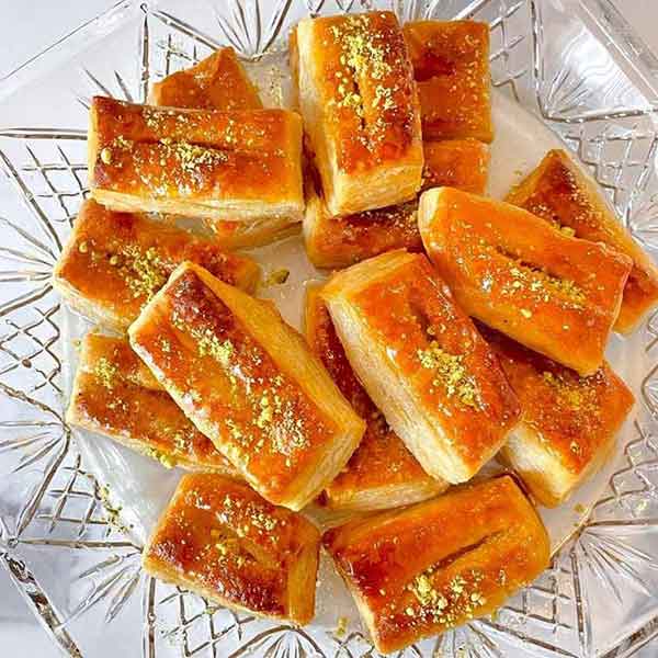 طرز تهیه شیرینی زبان با خمیر هزارلا طرز تهیه شیرینی زبان بدون خمیر هزارلا فوت و فن شیرینی زبان طرز تهیه شیرینی زبان در قنادی تهیه شیرینی زبان و پاپیونی رومال شیرینی زبان طرز تهیه شیرینی زبان با خمیر یوفکا