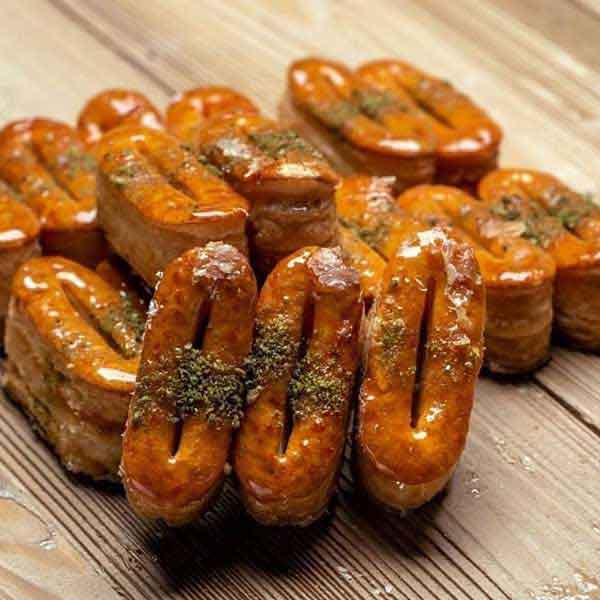 طرز تهیه شیرینی زبان با خمیر هزارلا طرز تهیه شیرینی زبان بدون خمیر هزارلا فوت و فن شیرینی زبان طرز تهیه شیرینی زبان در قنادی تهیه شیرینی زبان و پاپیونی رومال شیرینی زبان طرز تهیه شیرینی زبان با خمیر یوفکا