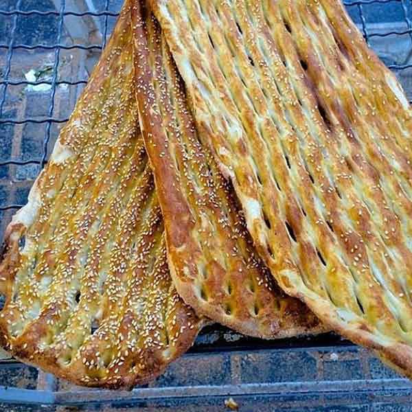طرز تهیه مایع روی نان بربری انواع رومال برای نان بربری رومال نان بربری در نانوایی نان بربری خانگی با آرد گندم طرز تهیه نان بربری بازاری فیلم پخت نان بربری در نانوایی مایع روی نان بربری چیست نان بربری نرم