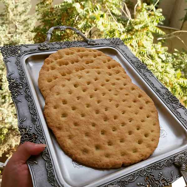 نون قندی قدیم طرز تهیه نان قندی با خمیر مایه نان قندی در ماهیتابه طرز تهیه نان قندی با ماست طرز تهیه نان قندی تنوری طرز تهیه نان قندی نازک چگونه نان قندی درست کنیم انواع نان قندی