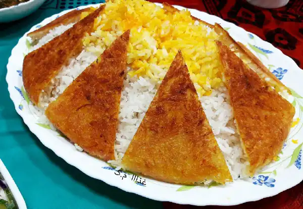راز خوشمزگی ته دیگ سیب زمینی رنده شده و فوت و فن ته دیگ سیب زمینی رنده شده